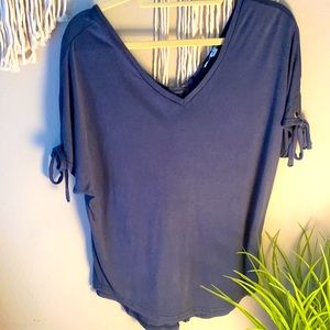 Blue top with tie back and sleeves